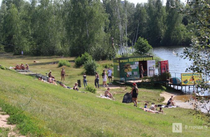 Спасение от адского пекла: фоторепортаж с пляжей Нижнего Новгорода - фото 61